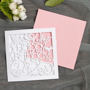 Detailed laser-cut butterfly floral patterns on a white Happy Birthday card