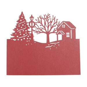 Detailed laser-cut red Christmas house table card with snowflake and tree patterns