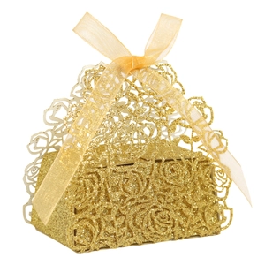 Close-up of laser-cut rose hollow candy box with gold glitter finish and organza ribbon