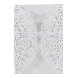 Elegant laser-cut white wedding invitation cover with intricate rose floral pattern