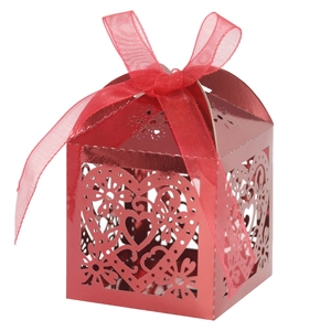 Metallic red hollow heart candy box with laser-cut floral patterns and a red organza bow