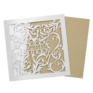 Detailed laser-cut Happy Birthday card with intricate floral patterns and kraft envelope