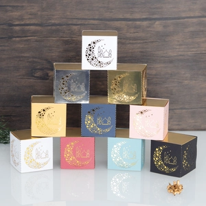 Detailed laser-cut moon and mosque party favors in assorted metallic and pastel colors