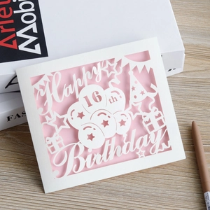 Elegant 16th birthday card with pink and white hollow-out design and festive patterns