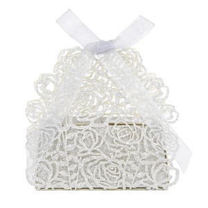 Elegant laser cut silver glitter candy box with rose patterns and a white ribbon bow