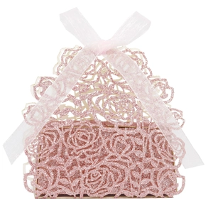 Light pink laser-cut hollow rose favor box with pink glitter and sheer ribbon bow