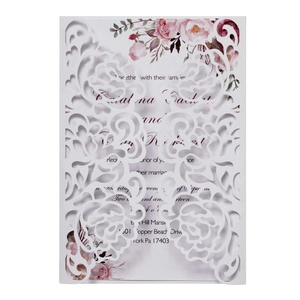 Detailed laser-cut rose hollow wedding invitation with watercolor floral inner card