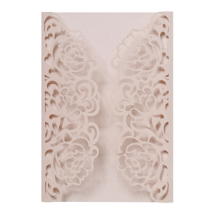 Elegant light pink laser-cut wedding invitation with hollow rose floral pattern