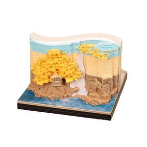 3D paper art notepad featuring a golden tree and waterfall landscape in ginkgo forest style