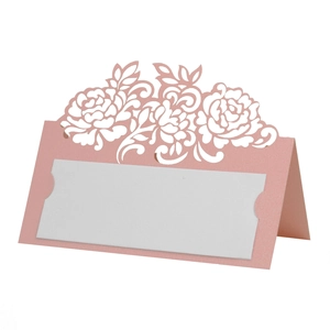 Detailed laser-cut pink rose paper place card with white insert for wedding table settings