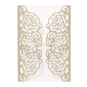 Macro detail of laser-cut hollow rose pattern on champagne gold glitter invitation card