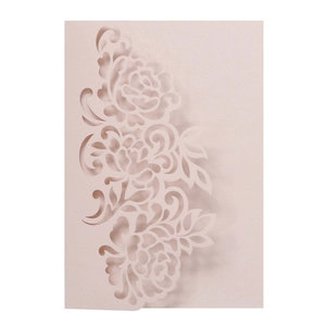 Detailed laser-cut floral pattern on elegant champagne gold pearlescent cardstock