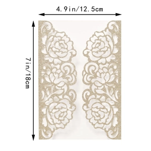 Close-up of gold glitter laser-cut floral invitation cover with size dimensions