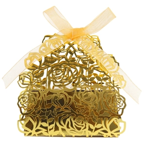Golden laser-cut hollow rose wedding favor box with a Sweet Heart orange ribbon bow