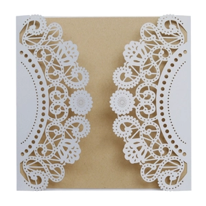 Elegant laser-cut lace wedding invitation cover with a kraft paper insert on white background