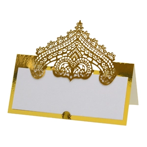 Elegant gold laser-cut lace place card for wedding tables with a white writing area
