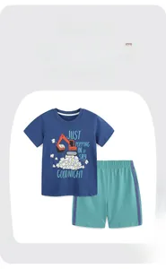 Detail of boys summer cotton set featuring excavator print T-shirt and drawstring shorts