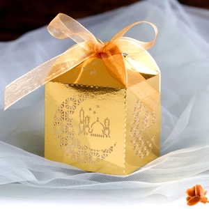 Detailed laser-cut silver candy box with crescent moon and palace patterns and ribbon