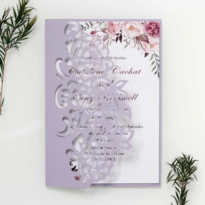 Detailed laser-cut purple floral invitation cover with elegant watercolor rose insert