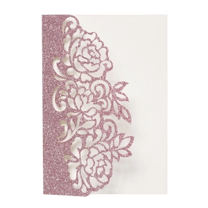 Detail of pink glitter laser-cut rose hollow invitation card for wedding and party