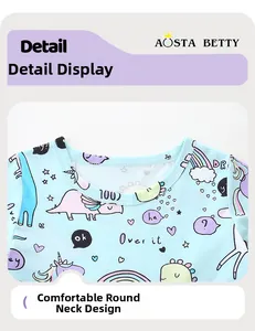 Close-up of comfortable round neckline on light blue cotton dress with cartoon prints