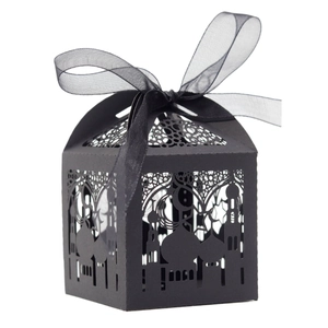 Laser-cut black hollow candy box with mosque pattern and organza bow for holiday parties