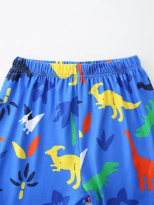 Short sleeve boy loungewear set featuring colorful cartoon dinosaur prints and elastic waist