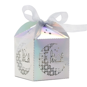 White iridescent laser-cut favor box with moon palace pattern and white organza ribbon