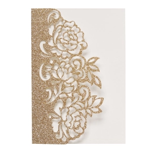 Detail of rose laser-cut pattern on gold glitter wedding invitation card cover