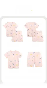 Dettagli del pigiama rosa per bambine con stampa libellula, maniche corte e pantaloncini