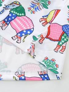 White girls' summer dress featuring colorful elephant print and durable hem stitching