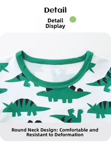 Détail de l'encolure ronde sur t-shirt enfant avec imprimé dinosaure vert mignon