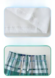 Detail of baby boy summer knit cotton set showing reinforced stitching and elastic drawstring waist