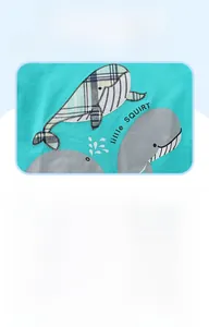 Detail shot of boys' cotton t-shirt with cartoon whale embroidery and ribbed crew neck