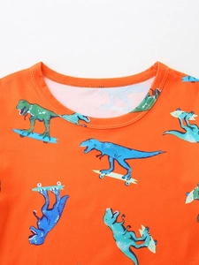 Kids orange short sleeve T-shirt with cartoon dinosaur prints and round neck detail