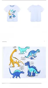 Close-up of colorful cartoon dinosaur prints on white kids cotton t-shirt fabric