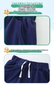 Détail du pantalon en maille bleu marine avec taille élastique et cordon blanc enfant