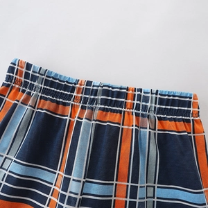 Pantaloncini a quadri per bambino con motivo tartan blu e arancio e vita elastica