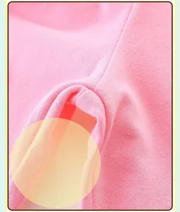 Detail shot of precise double-needle stitching on pink cotton girl's knit set