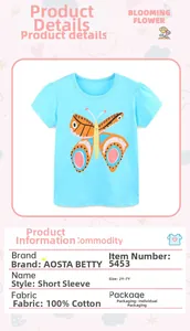 Detail of blue cotton girl's T-shirt with butterfly print and size chart table