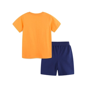 Back view of kids summer two-piece set featuring orange cotton t-shirt and navy blue shorts