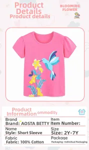 Detail view of pink cotton girls t-shirt featuring colorful hummingbird and flower prints