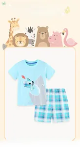 Close-up of blue cotton t-shirt with shark embroidery and matching checkered shorts set