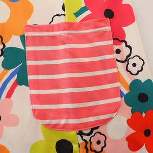 Girls floral short sleeve dress with pink striped pocket and vibrant flower pattern