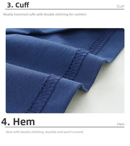 Detail eines blauen Jungen-T-Shirts mit Doppelnahtsaum und umgeschlagenen Ärmelbündchen