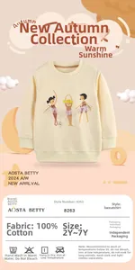 Detail of beige cotton sweatshirt showing three ballerinas print and 100% cotton label
