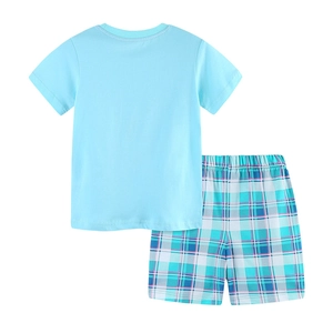 Boys light blue short sleeve cotton t-shirt with plaid shorts summer set on white background