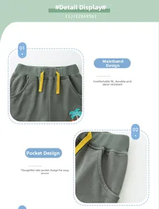 Dettaglio pantaloncini in cotone verde per bambini con coulisse gialla e ricamo palma