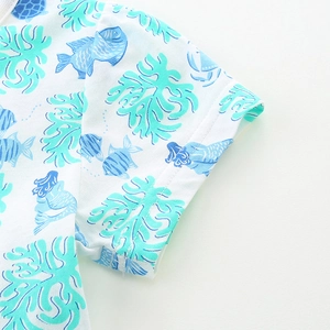 Abito estivo da bambina con stampe di sirene blu e coralli in cotone a maglia