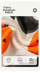 Dettaglio del tessuto in 100% cotone con stampe di zucche arancioni per bambini